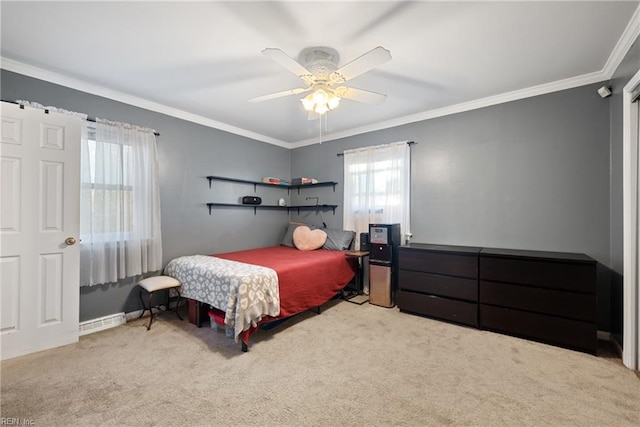 carpeted bedroom featuring ceiling fan and ornamental molding