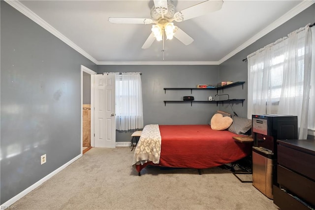 carpeted bedroom with ornamental molding, ceiling fan, and multiple windows