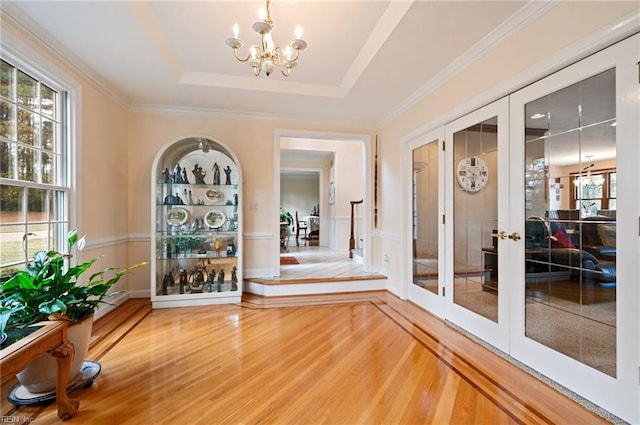 interior space with hardwood / wood-style floors and plenty of natural light