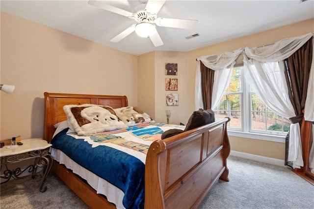 carpeted bedroom featuring ceiling fan