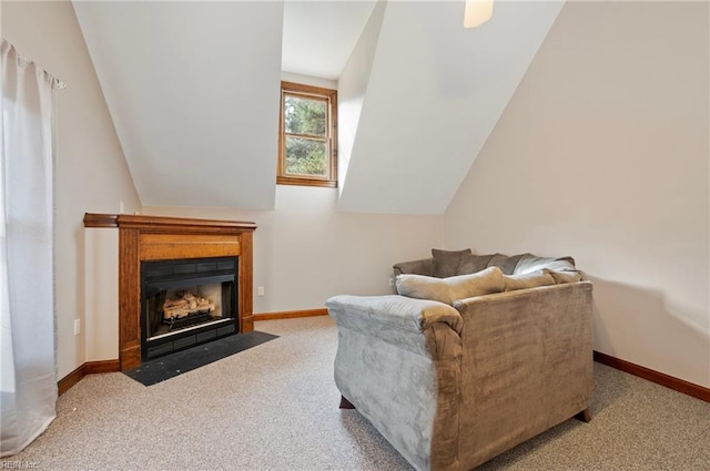 carpeted living room with lofted ceiling