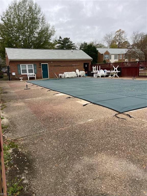 view of swimming pool featuring a patio