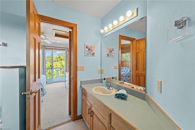 bathroom featuring vanity and ceiling fan