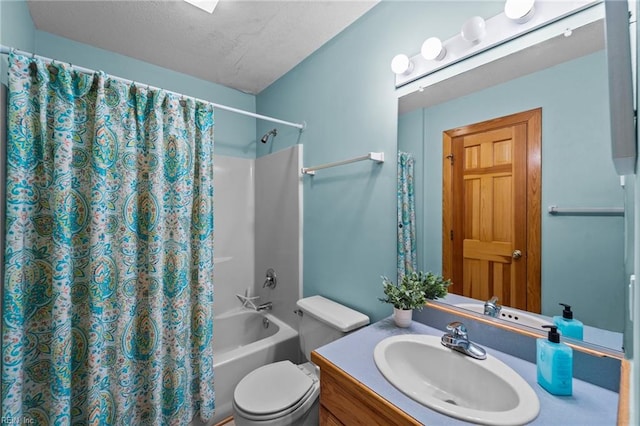 full bathroom featuring toilet, a textured ceiling, vanity, and shower / tub combo with curtain