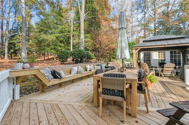 deck featuring a gazebo and an outdoor hangout area