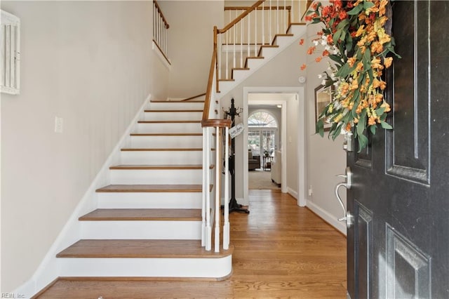 entryway with hardwood / wood-style flooring