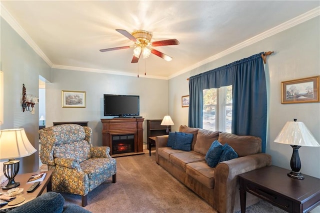 carpeted living room with ceiling fan and ornamental molding