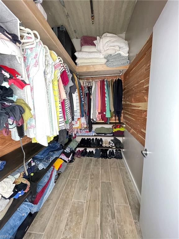 walk in closet featuring wood-type flooring