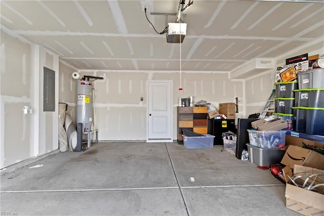 garage featuring a garage door opener, electric panel, and water heater