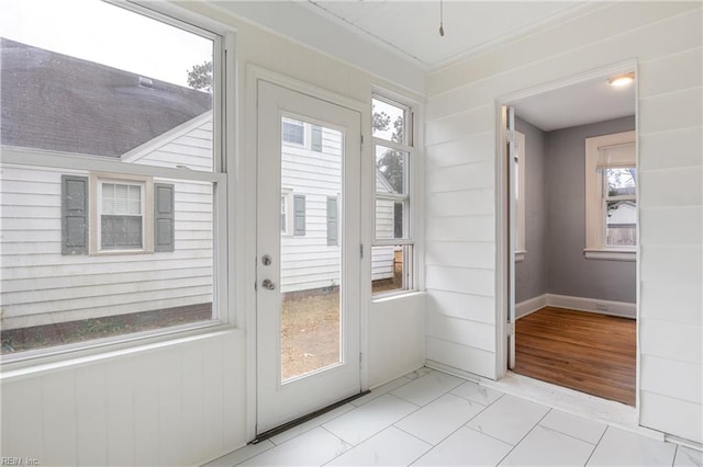 doorway to outside featuring light wood-type flooring