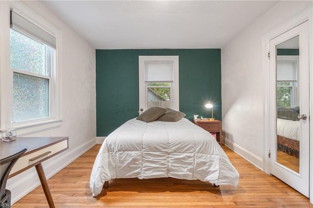 bedroom with light wood-type flooring