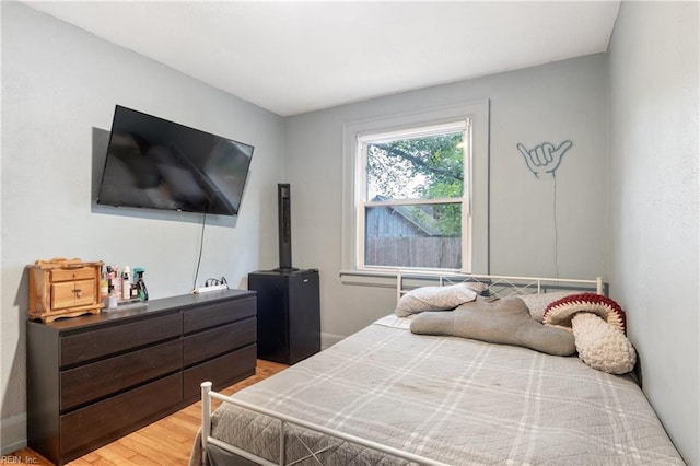 bedroom featuring hardwood / wood-style flooring