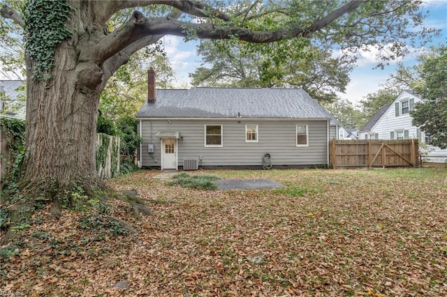 back of property with central AC unit