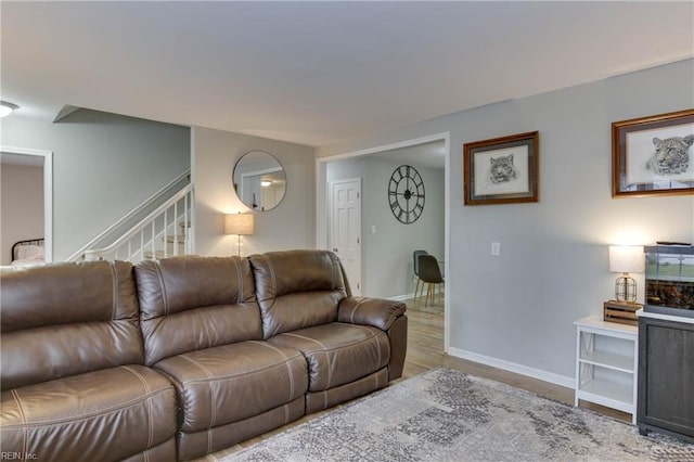 living room with light hardwood / wood-style floors