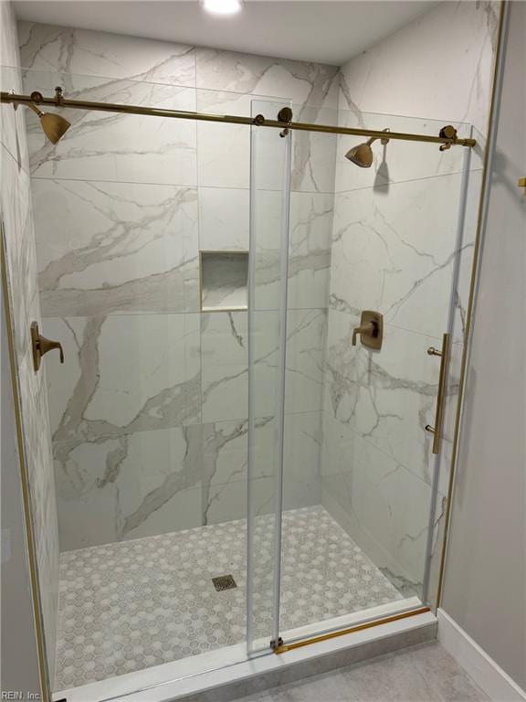 bathroom with an enclosed shower