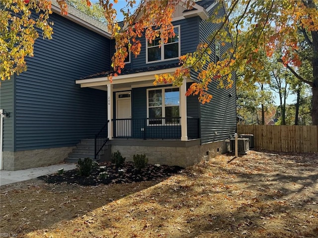 craftsman-style house featuring central air condition unit