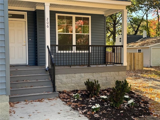 doorway to property featuring a porch