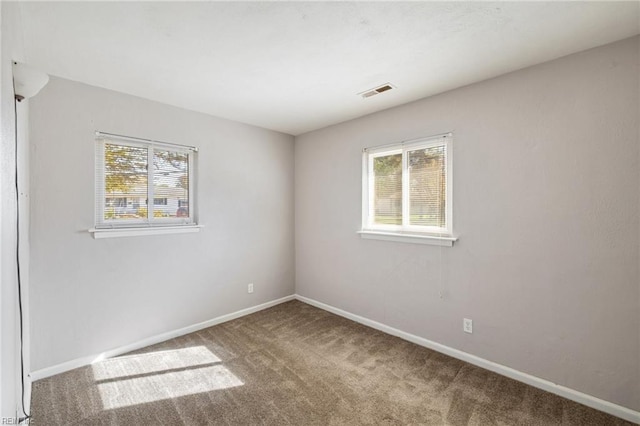 view of carpeted spare room