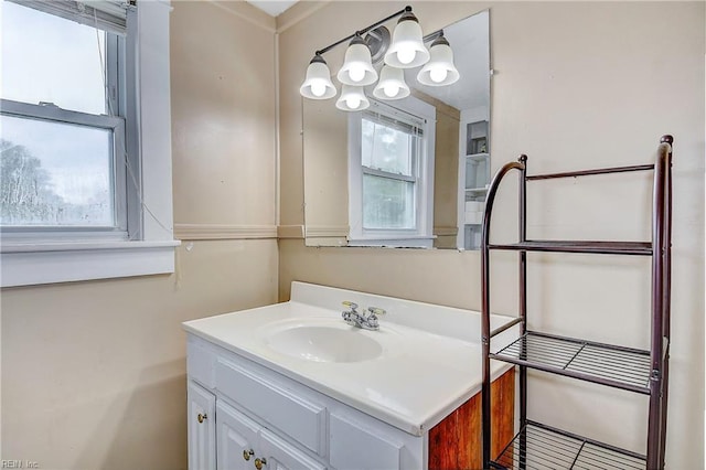 bathroom with vanity and a healthy amount of sunlight