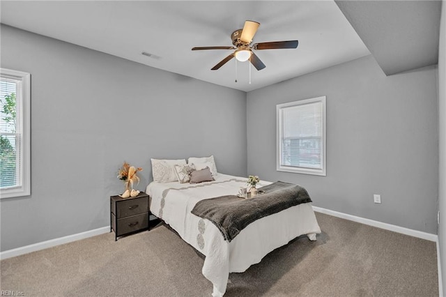 bedroom featuring ceiling fan and carpet floors