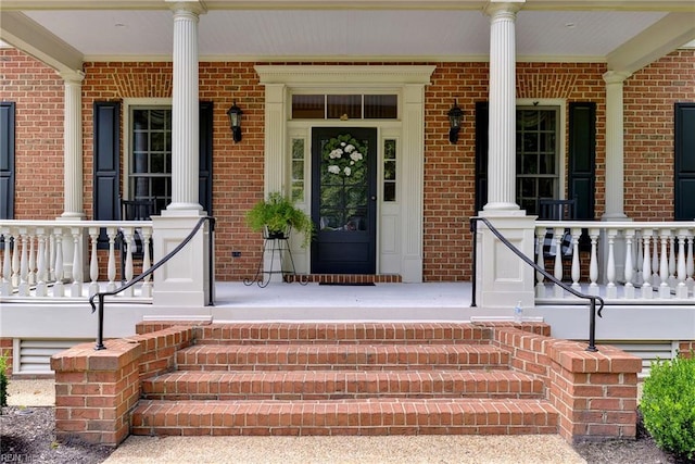 doorway to property featuring a porch