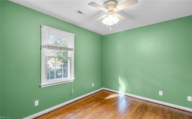 unfurnished room featuring ceiling fan and wood-type flooring