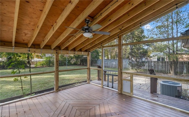 unfurnished sunroom featuring vaulted ceiling and ceiling fan