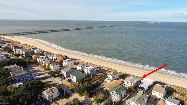 bird's eye view with a beach view and a water view