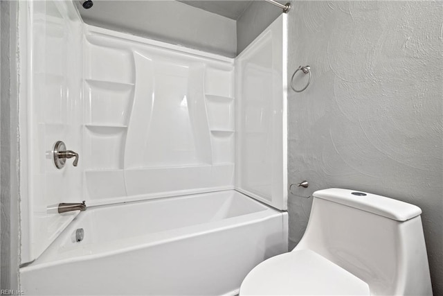 bathroom with toilet and shower / tub combination