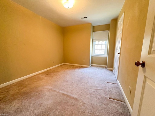 unfurnished room featuring carpet floors