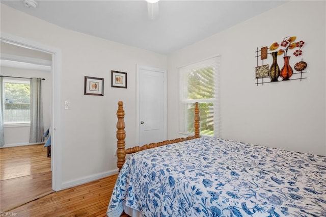 bedroom featuring ceiling fan and hardwood / wood-style flooring