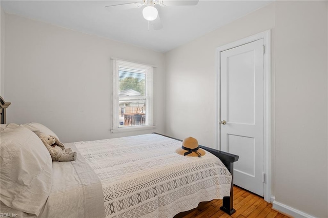 bedroom featuring ceiling fan and light wood-type flooring