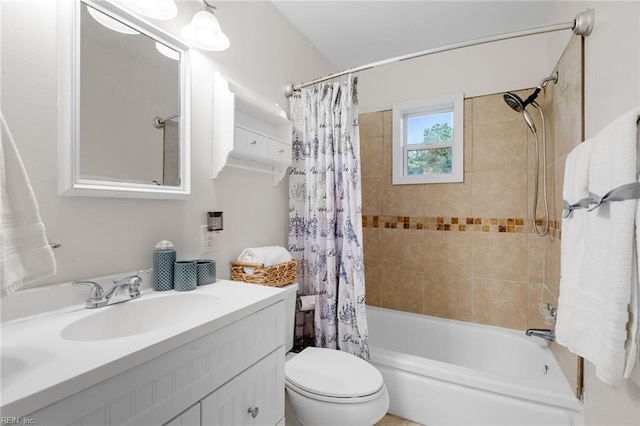 full bathroom with shower / bathtub combination with curtain, vanity, and toilet