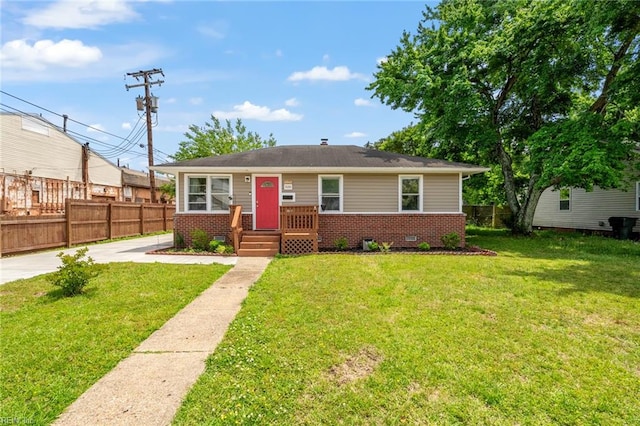 view of front of property with a front lawn