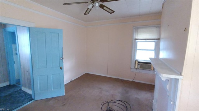 carpeted spare room with ceiling fan, cooling unit, and crown molding