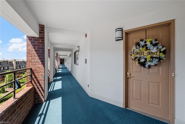 doorway to property with a balcony