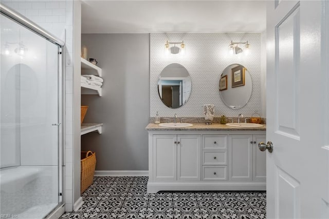 bathroom featuring tile patterned flooring, vanity, and an enclosed shower