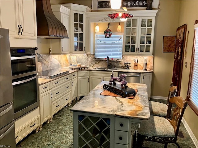 kitchen with premium range hood, backsplash, sink, and stainless steel appliances