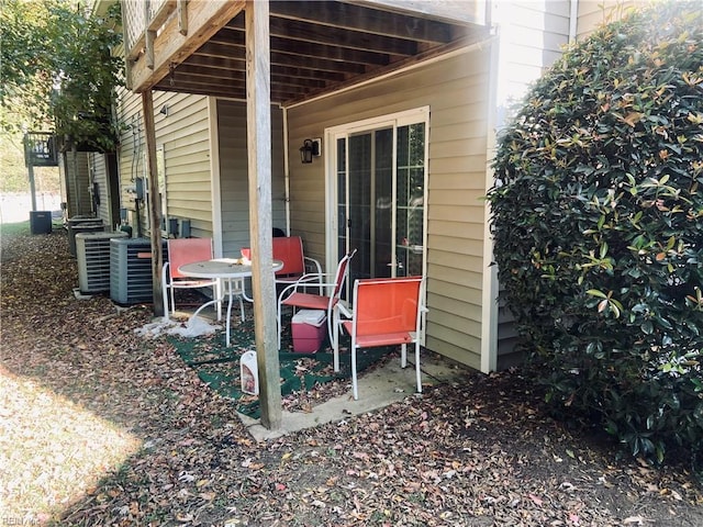 view of patio with a wooden deck and cooling unit