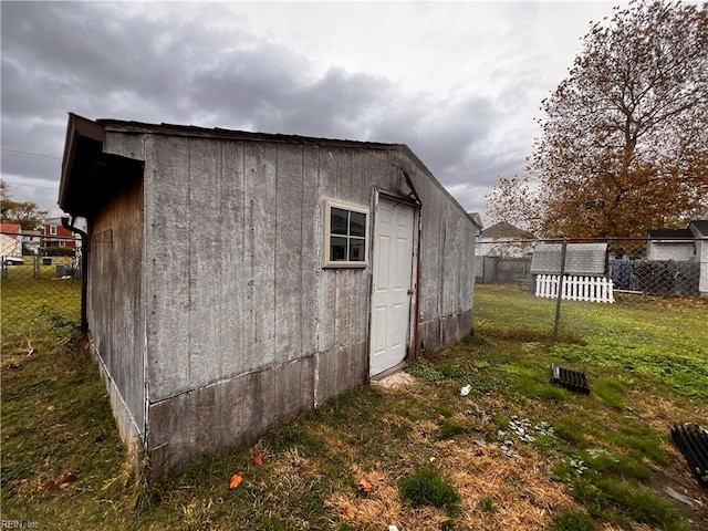 view of outdoor structure featuring a yard