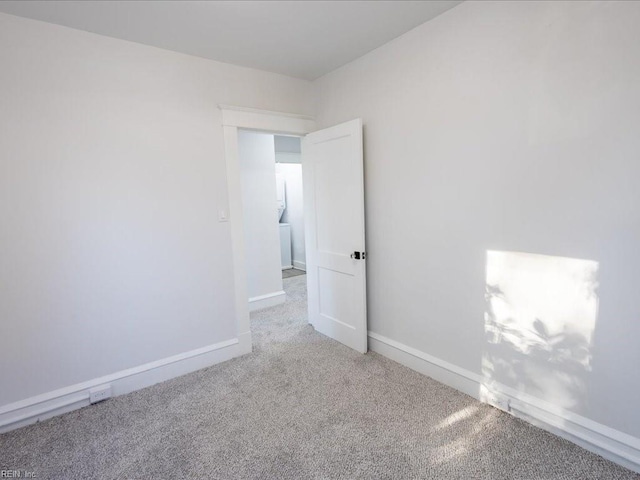 empty room featuring carpet floors