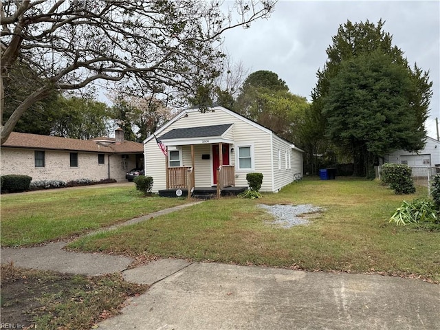 bungalow with a front lawn