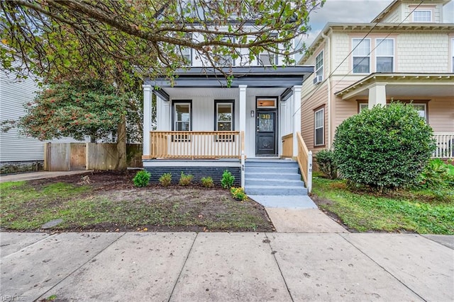 view of front of home featuring covered porch