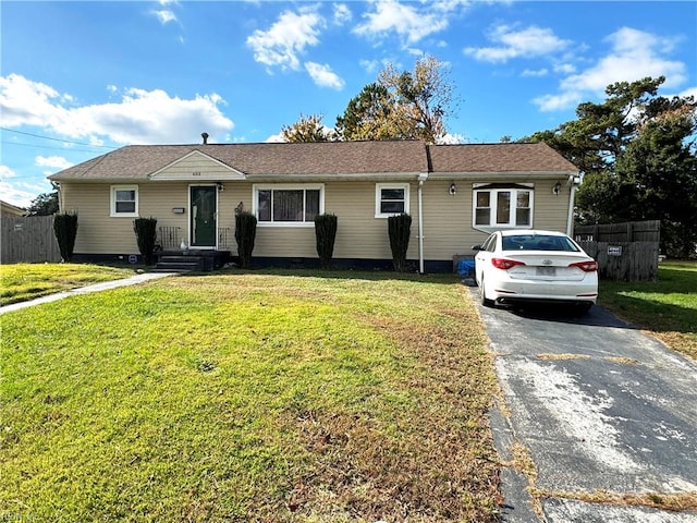 ranch-style home with a front yard