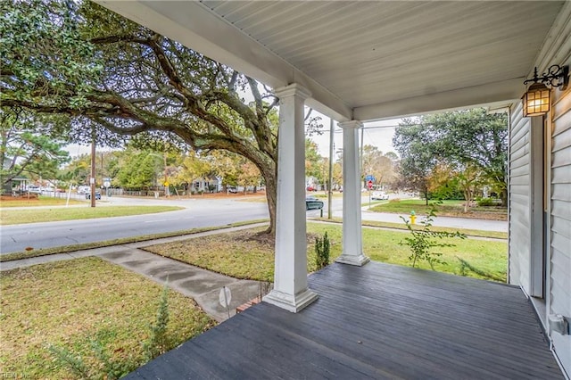 wooden terrace featuring a porch