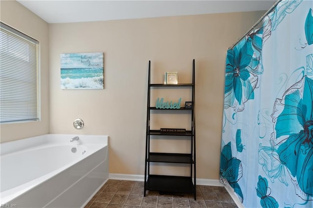 bathroom featuring separate shower and tub