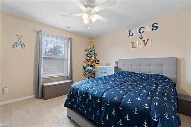 carpeted bedroom featuring ceiling fan