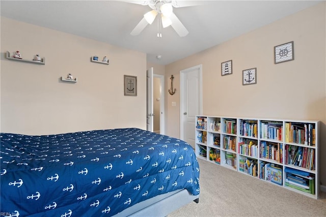 bedroom with ceiling fan and carpet floors