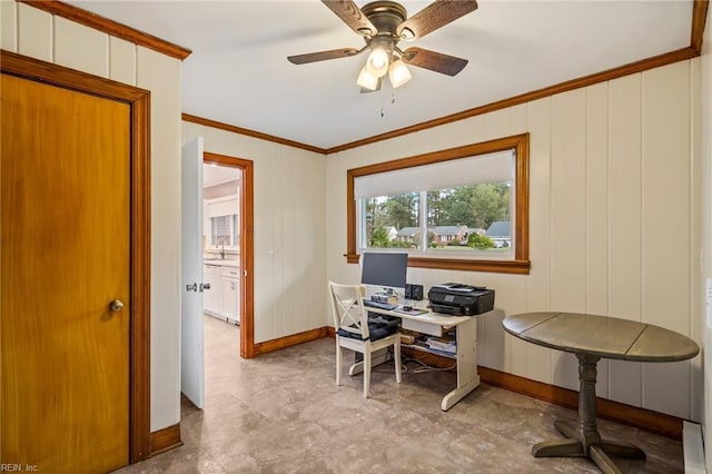 office featuring ceiling fan and ornamental molding