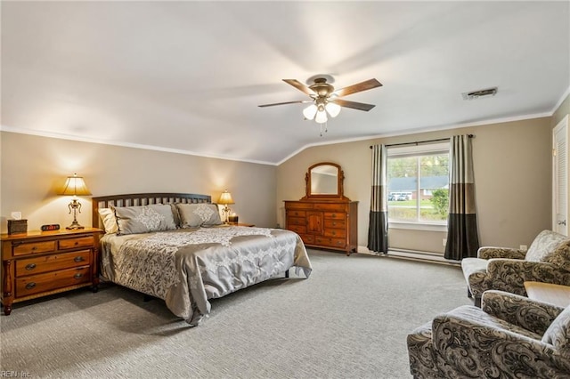 bedroom featuring ceiling fan, crown molding, lofted ceiling, and carpet floors